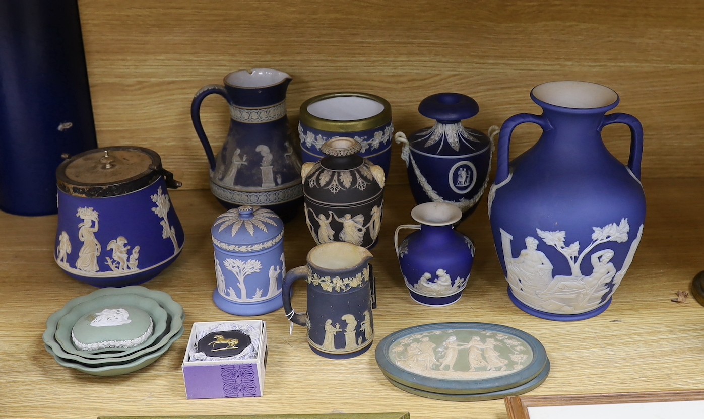 A collection of Victorian and later Jasperware, including a 19th century Wedgwood version of the Portland vase, 23 cms high